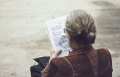 Woman reading on bench