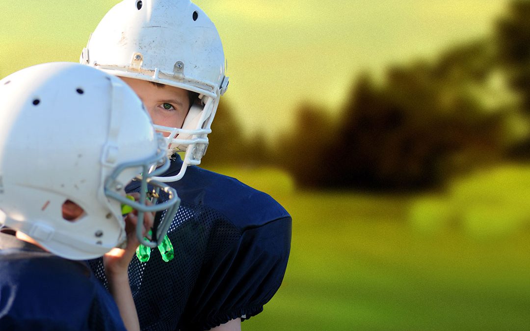 Former professional football player Merril Hoge encourages kids to play sports and parents to support them