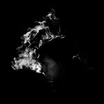 white smoke with shadow of a man