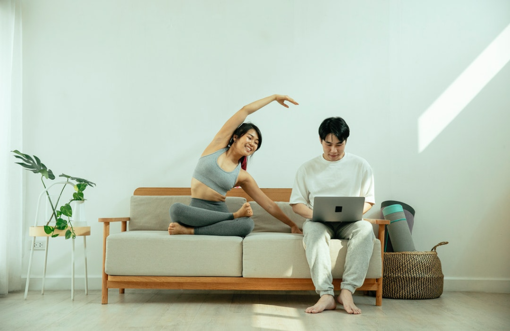 Yoga couple on couch