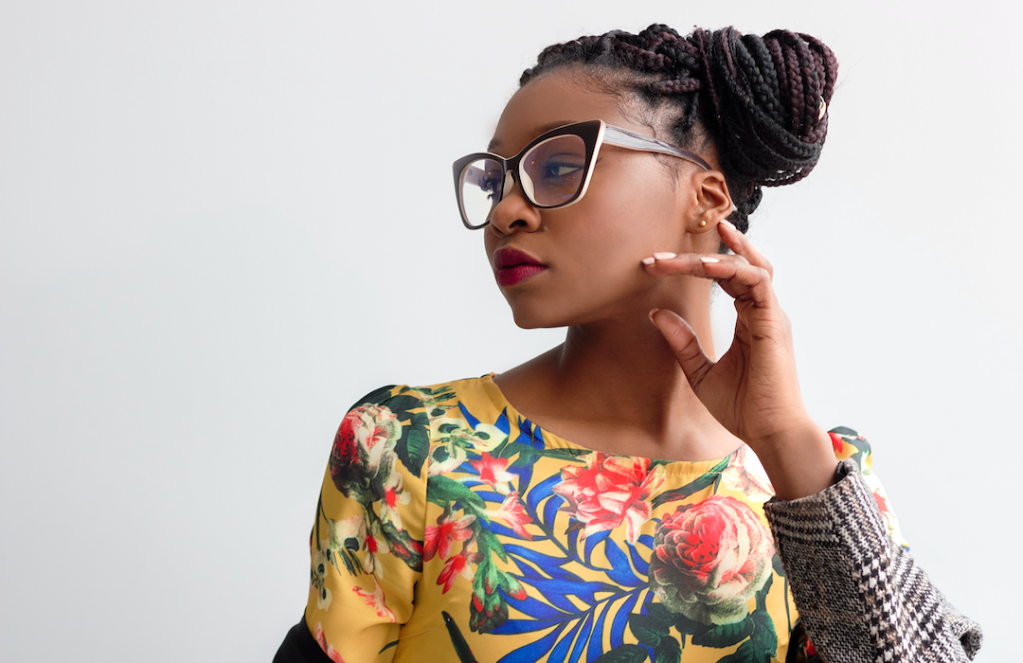 photo-of-woman-wearing-yellow-floral-top