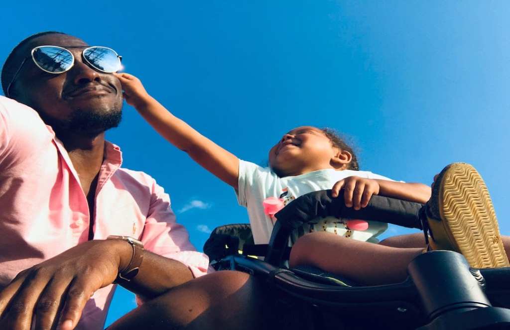 baby-approaching-men-s-black-sunglasses