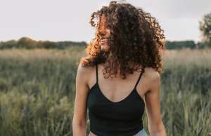 Woman in a black shirt in a field