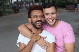 Happy hispanic couple smiling and laughing together