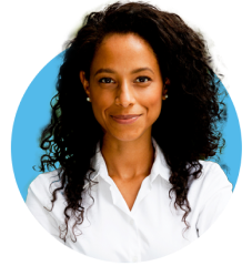 career-thumbnail.png Woman with black curly hair and white shirt looking straight forward and grinning.