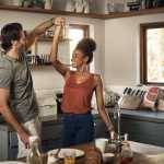 Couple dancing in a kitchen
