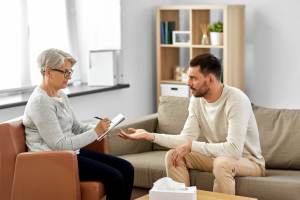 Is it okay for my husband to have a personal relationship with his therapist?