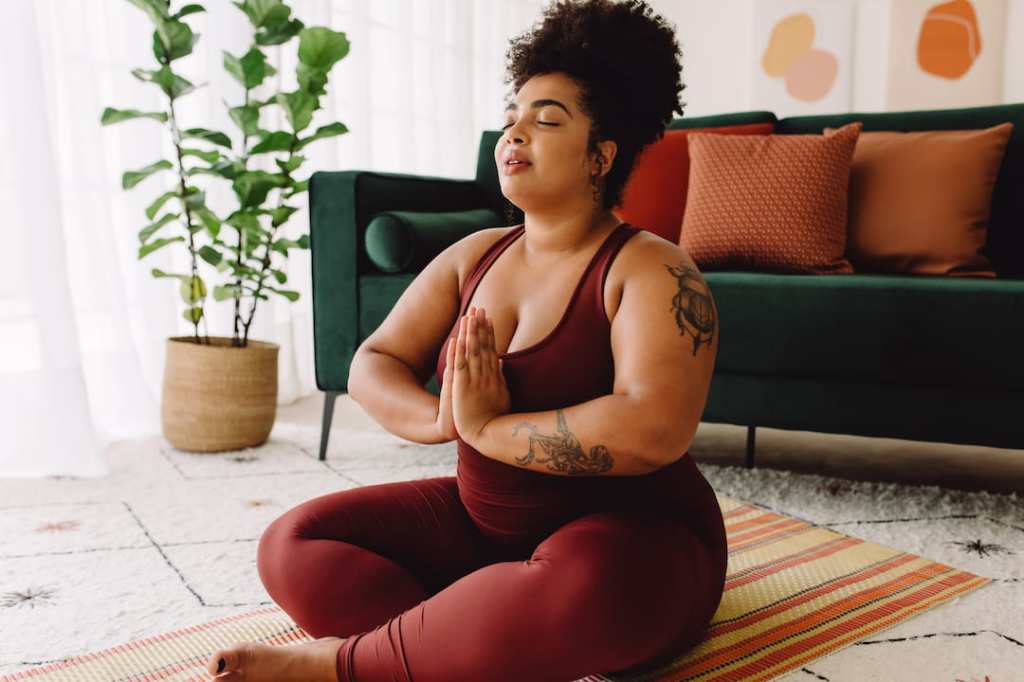 Woman doing yoga in a home